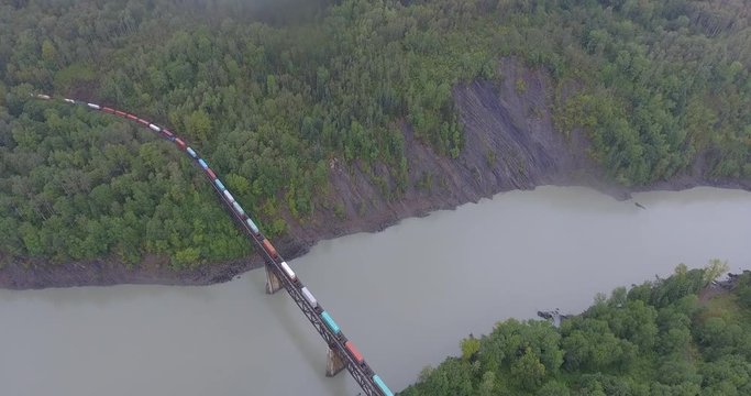 CN Rail train enroute to Prince Rupert British Columbia. The train is crossing a Trestle called "Skeena Crossing" that was constructed in 1911.