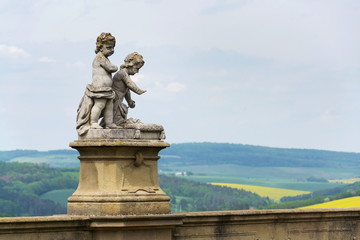 Fototapeta premium Statues at unique baroque cemetery Strilky, Kromeriz district, Zlin region, Moravia, Czech Republic, Central Europe