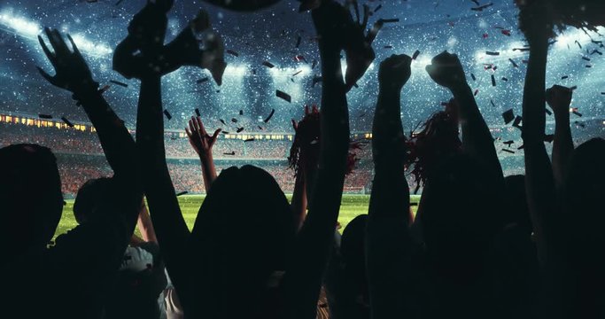 Fans celebrating the success of their favorite sports team and waving hands on the stands of the professional stadium while it's snowing. Stadium is made in 3D and animated.