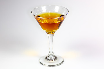 A delicious cocktail waiting on a white counter waiting to be consumed