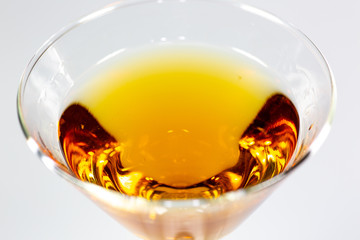 A delicious cocktail waiting on a white counter waiting to be consumed