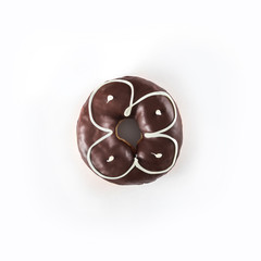 Chocolate glazed donut, top view over white background, isolated. With nuts
