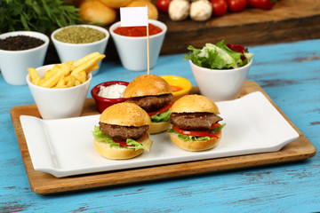 Small beef sliders grilled burgers - Three small burgers