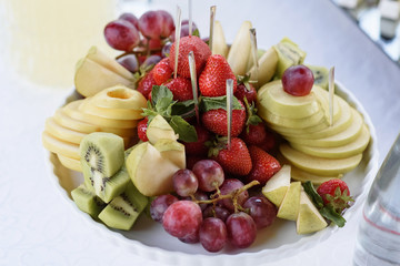 Plate with bright and fresh fruit.