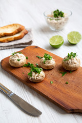 Mushroom and chicken puree with lime and toasts, side view.