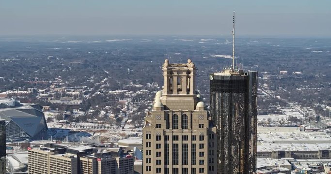 Atlanta Aerial v403 Panning around downtown skyscrapers, detail snow view 1/18