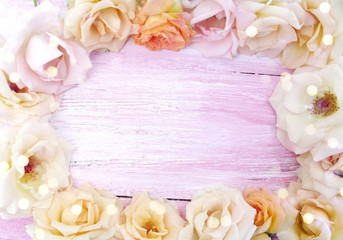 beautiful flowers on a wooden background