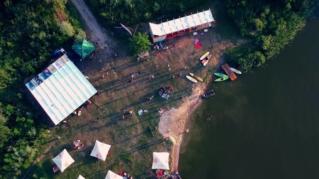 POLTAVA, UKRAINE - JUNE 18, 2016: people have a happy time in park near lake - Powered by Adobe