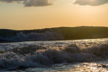 Amazing sea sunset, the sun, waves, clouds