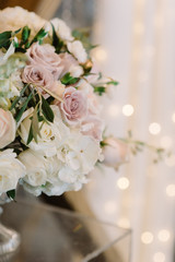 Flowers on a glass support.
