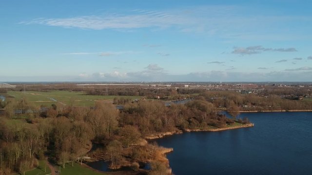 Netherlands – Amsterdam South East – Gaasperpark – Drone view over the water towards Weesp