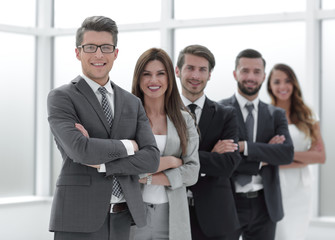 professional business team standing next to the office window