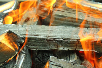 Beautiful burning firewood. Close-up. Background. Texture.