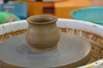Clay pot on a potter's wheel