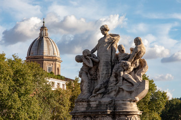 Fototapeta na wymiar The Dome of Chiesa Clemens XII Catholic Church from Ponte Vittorio Emanuele II crossing the River Tiber