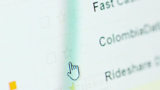Macro shot of email inbox browsing on a computer monitor