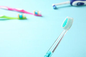 Manual toothbrush on color background. Dental care
