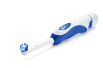 Electric toothbrush on white background. Dental care