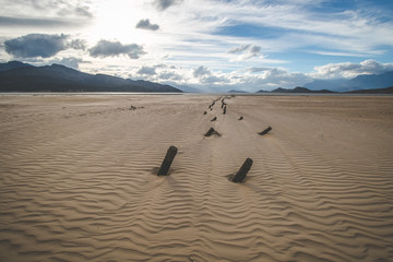 Wide angle landscape view of an old jetty in a dried up dam in the Western Cape of South Africa