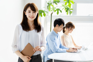 Obraz premium portrait of young asian group in office