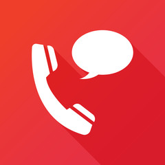 Phone receiver as "contact us" icon. Telephone handset with talk bubble isolated on red background. Modern design flat style icon with long shadow effect
