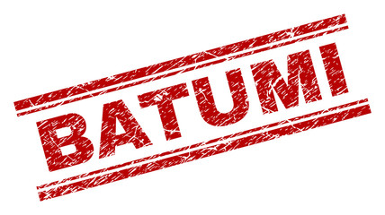BATUMI seal print with corroded texture. Red vector rubber print of BATUMI label with retro texture. Text label is placed between double parallel lines.