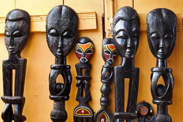 West African Wood Carvings for Sale at an Outdoor Market in Accra Ghana - obrazy, fototapety, plakaty