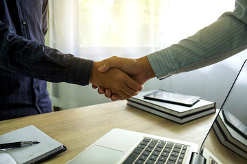 Business handshake. Business people shaking hands, finishing up a meeting,Success agreement negotiation.