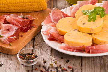 Speck ham and polenta.