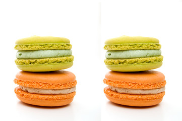 Delicious Isolated Orange and Green Stacked Macarons