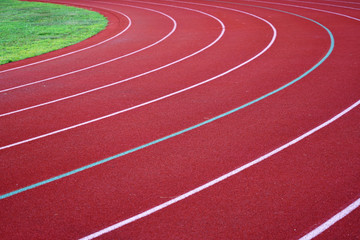 red outdoor running track in sport field