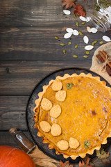 Traditional homemade American pumpkin pie for a holiday/ Place for text