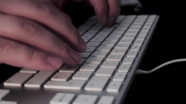 A clip of a web developers keyboard, while coding a javascript application.