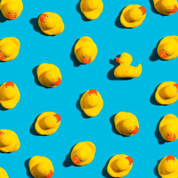One out unique rubber duck concept on a blue background