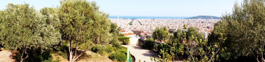 Beautiful panorama to the city of Barcelona and the sea from the observation platform in the Park Guël
