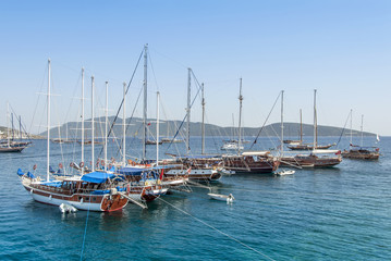 Fototapeta na wymiar Bodrum, Turkey, 23 May 2011: Gulet Wooden Sailboats at Cove of Kumbahce