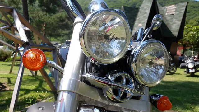 Bike headlights detail in sunny day outdoors