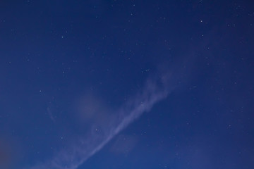 Obraz na płótnie Canvas NIght sky with stars and white cloud
