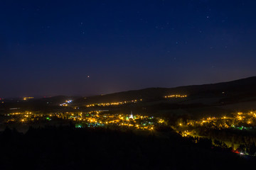 Night sky with village Kremze, Czech landscape