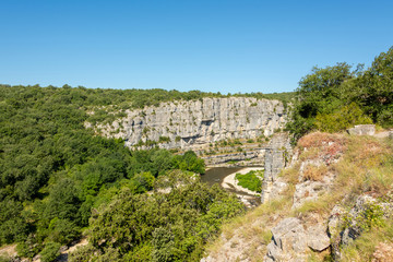 Fototapeta na wymiar Beautiful landscape with gorges and rocks at the river Ardeche at 