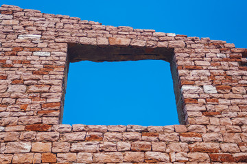 window in old brick wall