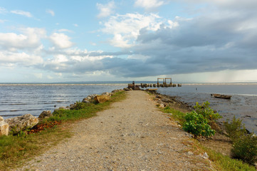 Fototapeta na wymiar marine pier or mound in the sea