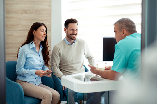 Patients consulting the dentist at dental clinic