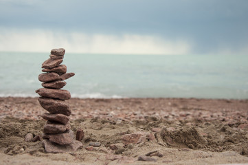 Fototapeta na wymiar stack of stones in the beach