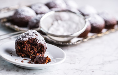 Homemade bakery and sweet muffins with powdered sugar