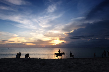Fototapeta na wymiar Holiday at Jimbaran beach, Bali, Indonesia.