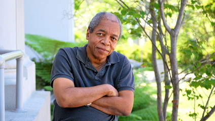 Fototapeta premium African american male expressions alone outdoors.