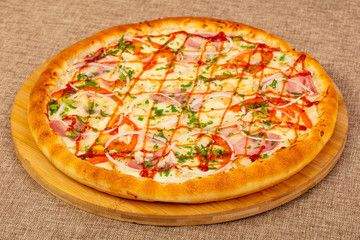 Pizza with ham and chicken