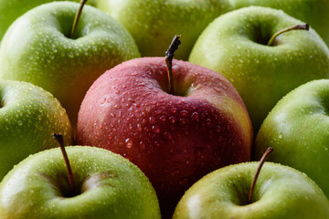 full frame of water drops on green and red apples backdrop