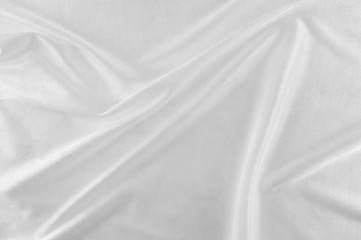 Fototapeta na wymiar Smooth white silk or satin texture.